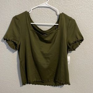 This is a GAP army green shirt with little ruffles on the sides and bottom seams